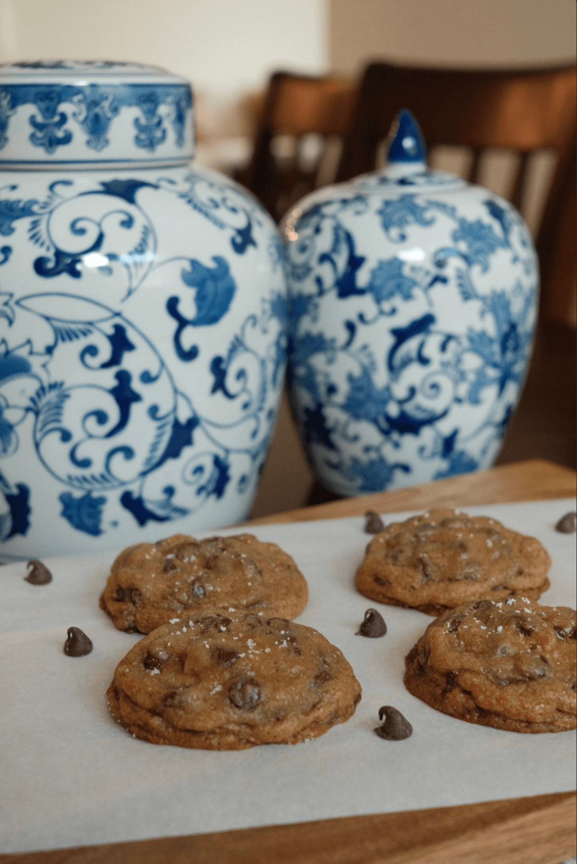 Fresh baked cookies in front of blue vases